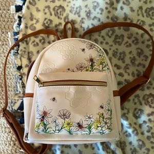 BRAND NEW Hot topic flower and bed small bag.